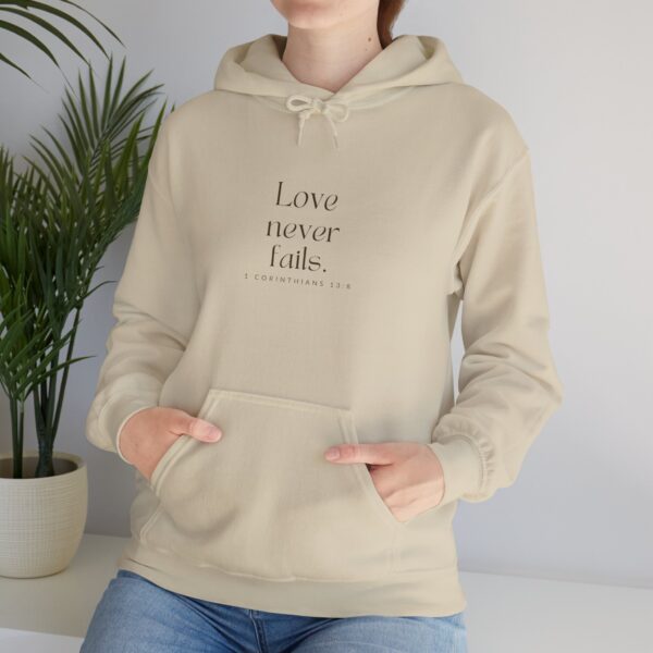 Love never fails. - 1 Corinthians 13:8 | Unisex Hooded Sweatshirt | Team Yeshua Apparel - Image 6